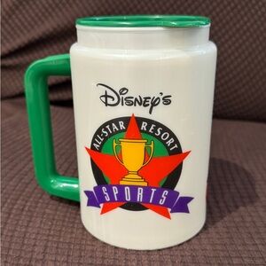 Disney White Travel Mug with Green Handle and Sports Logo